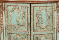 An Italian Painted and Parcel Gilt Corner Cabinet with Faux Marble Top