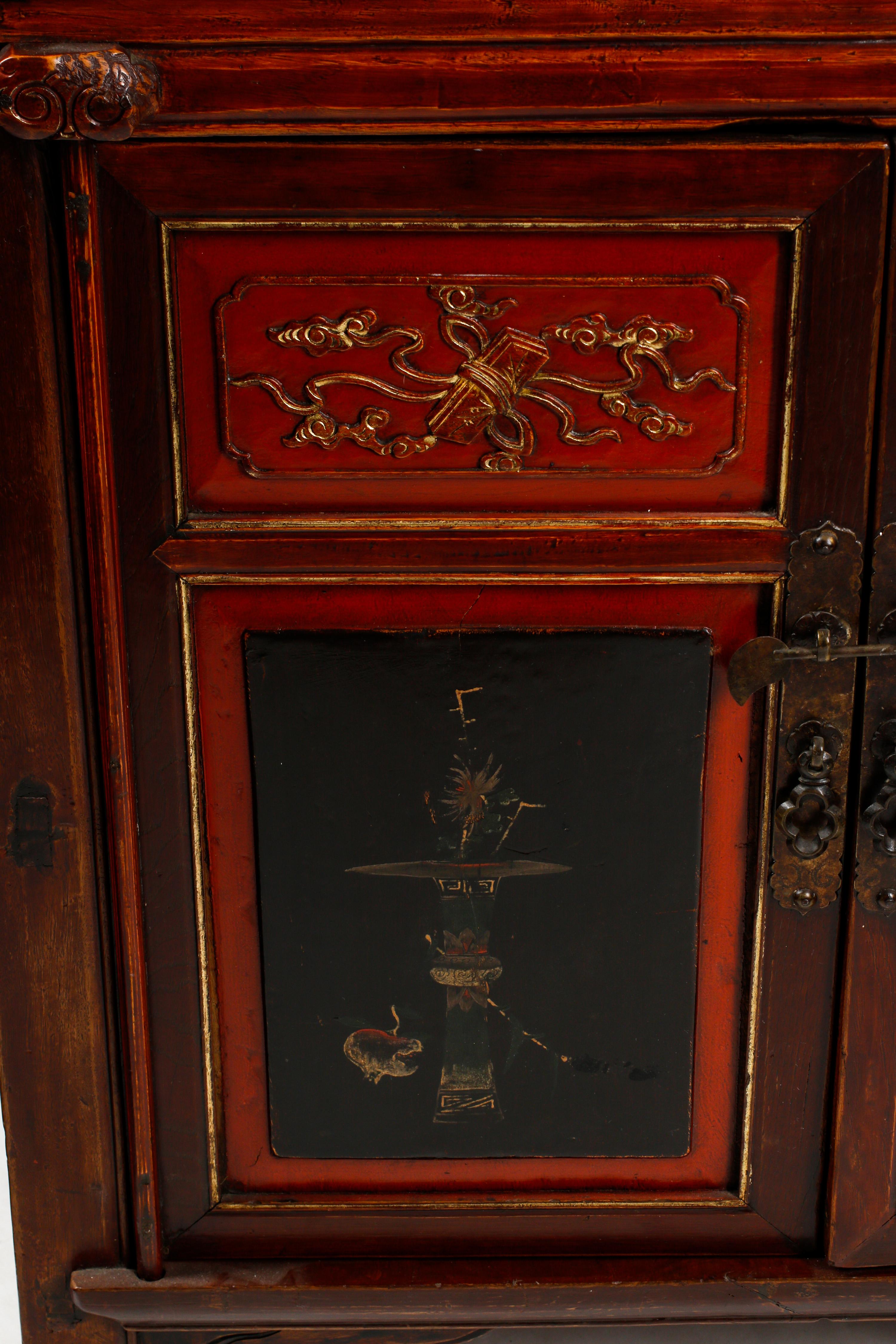 A Pair of Chinese Hardwood and Lacquer Panel-Inset Cabinets