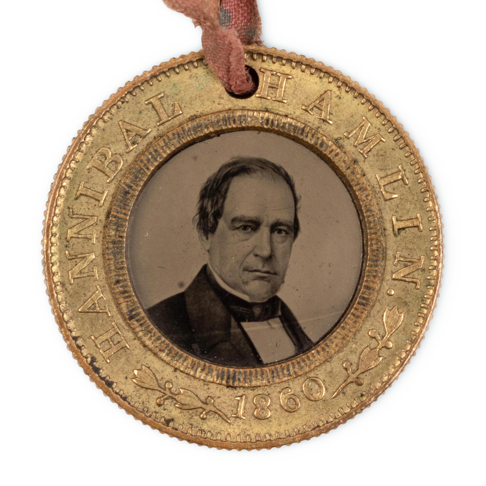 [LINCOLN-HAMLIN CAMPAIGN]. A presidential campaign token featuring ferrotype portraits of Lincoln and Hamlin, ca. 1860.