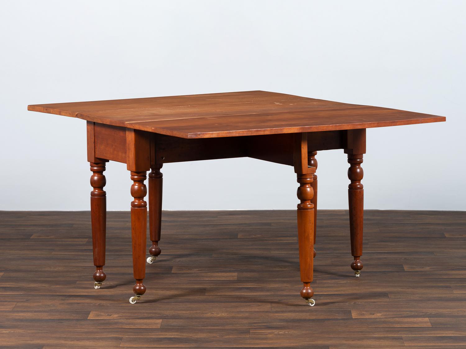 A Late Federal Cherrywood Drop-Leaf Dining Table (Please send consignor donation receipt once donated)