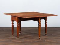 A Late Federal Cherrywood Drop-Leaf Dining Table (Please send consignor donation receipt once donated)