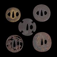 Group of nine Japanese tsuba Meiji period and earlier