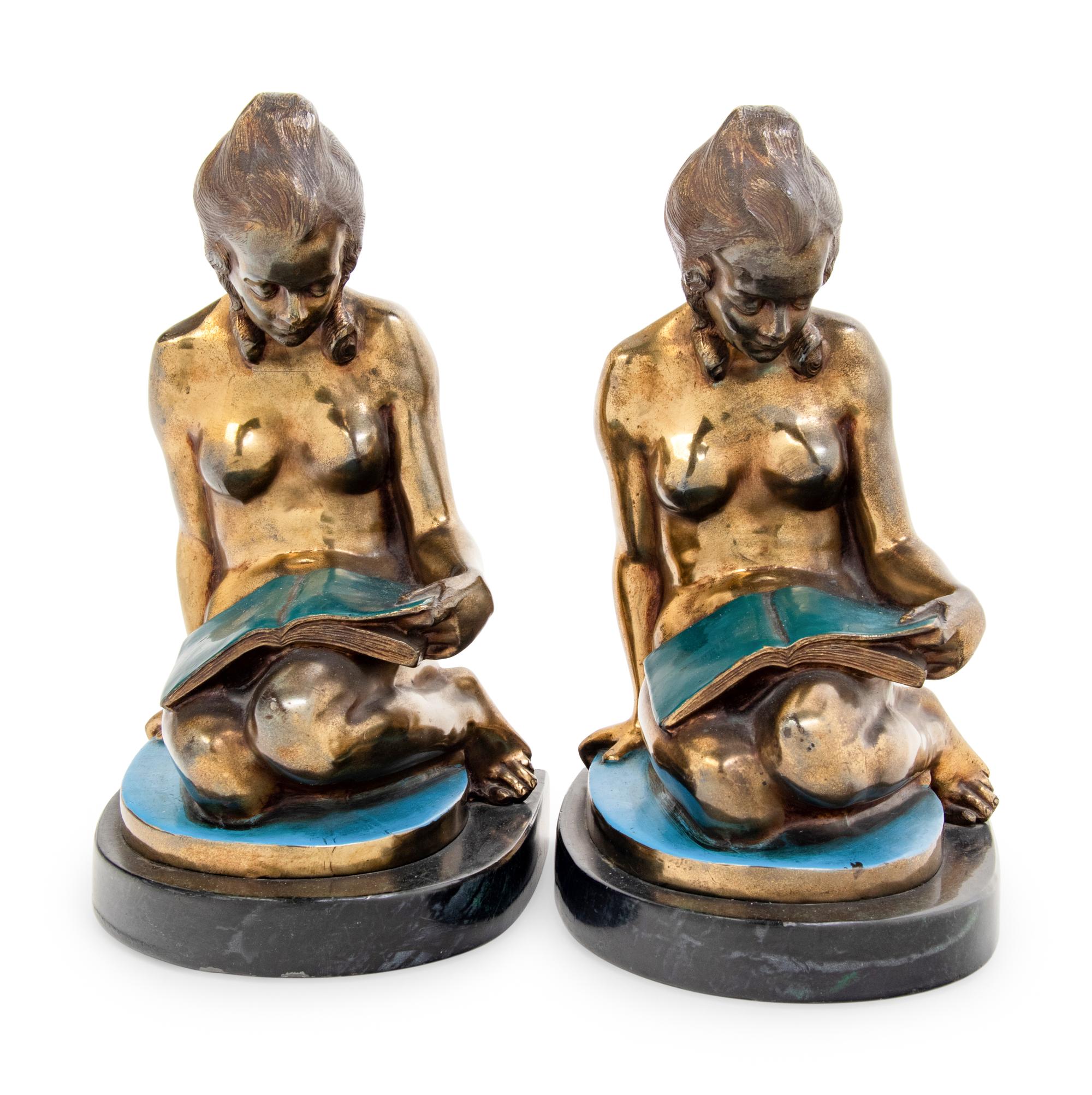 A Pair of Gilt Metal Figures of Seated Maidens
