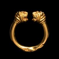 A Western Asiatic Gold Bracelet with Lion Headed Terminals