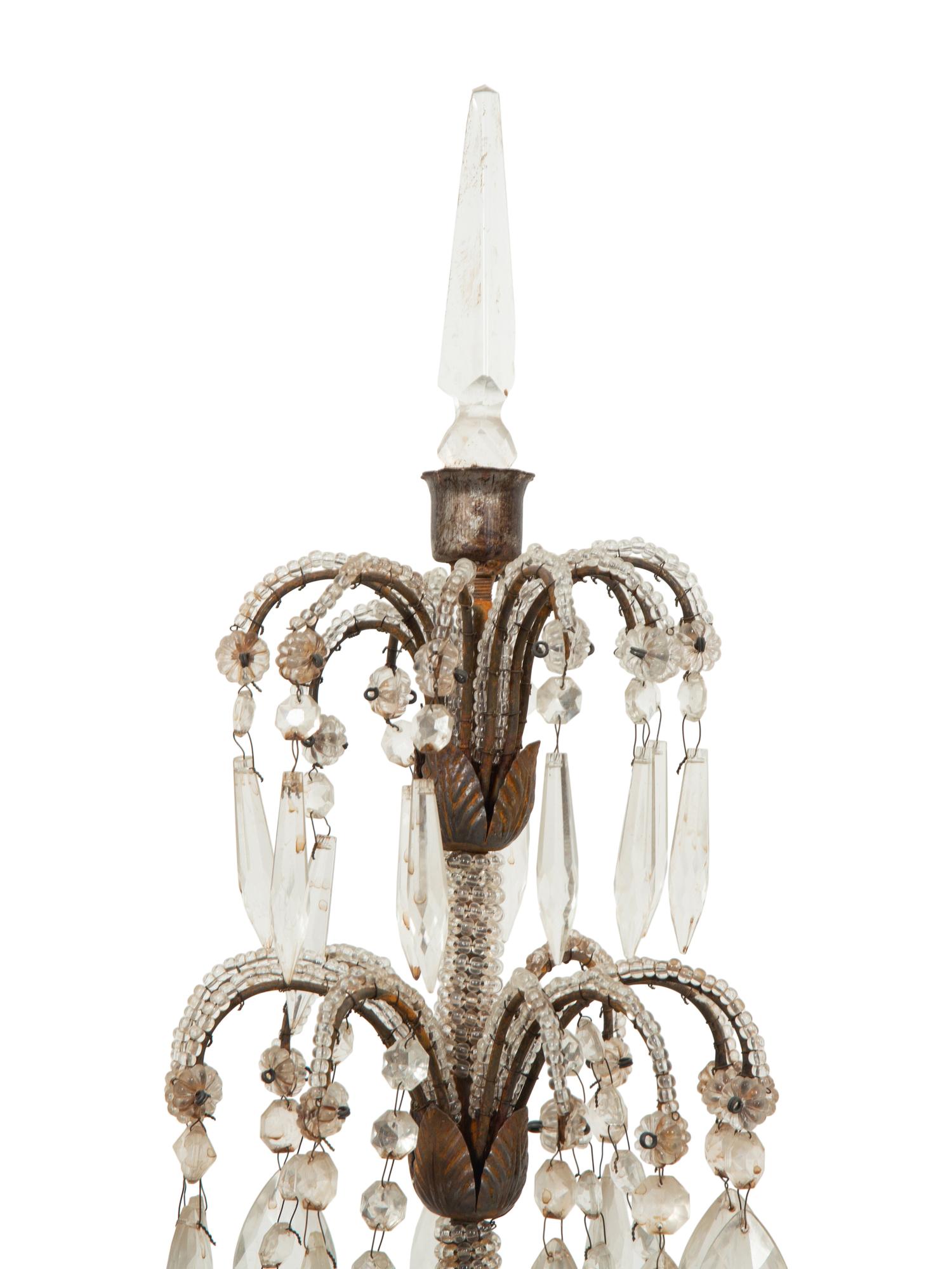 A Pair of Continental Carved Silvered Wood, Cut Glass and Beaded Candelabra