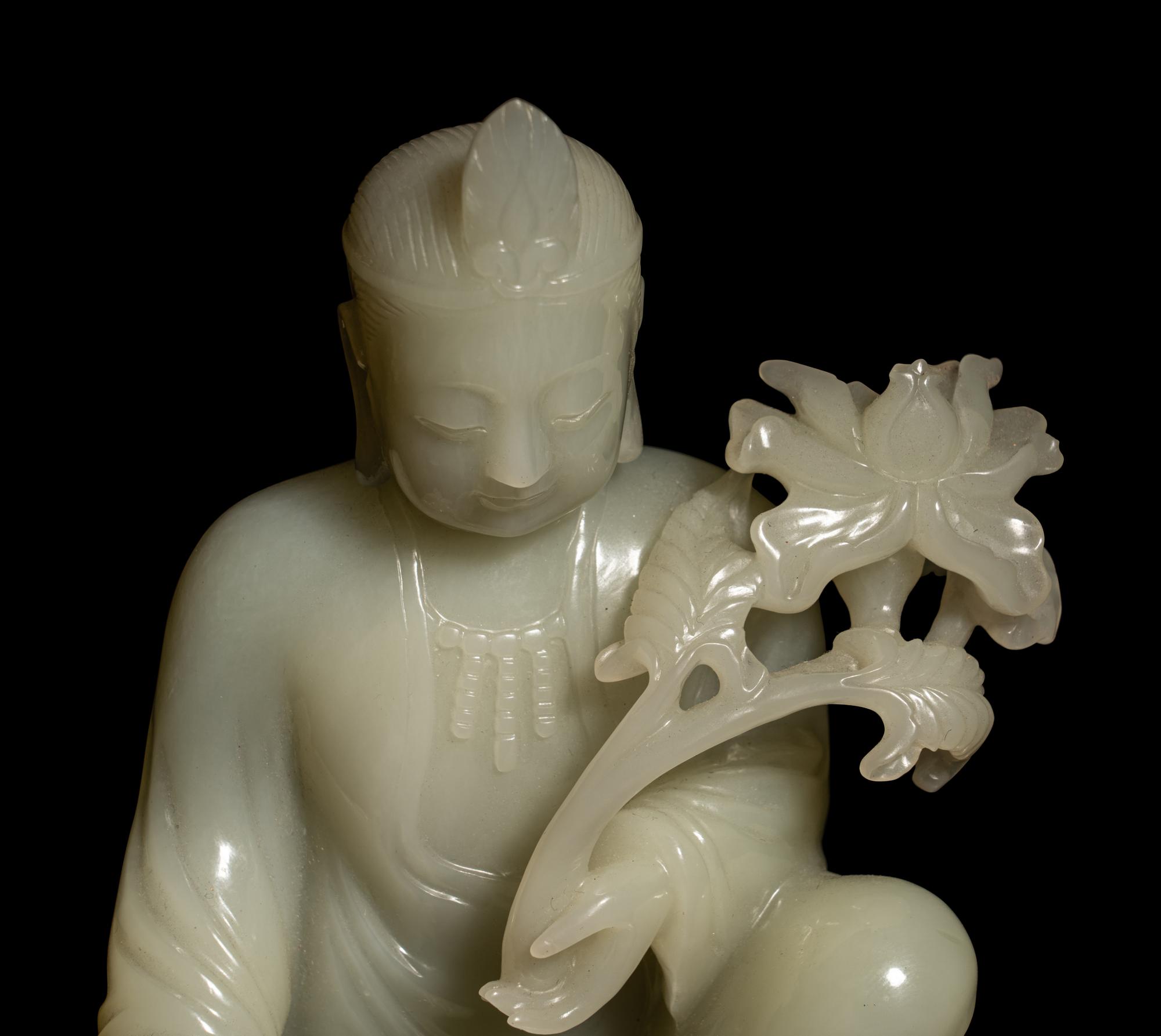 A Pale Celadon Jade Figure of Guanyin