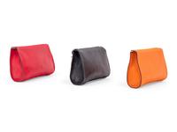 Three Hermès Leather Karo Trousse Cosmetic Bags, 2000-2013