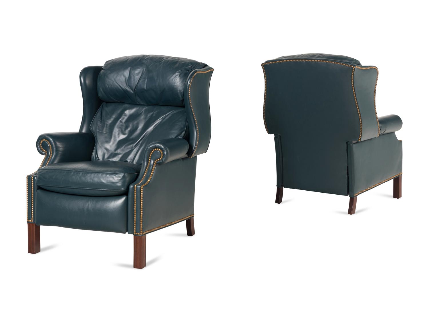 A Pair of George III Style Mahogany and Leather Upholstered Reclining Wingback Chairs