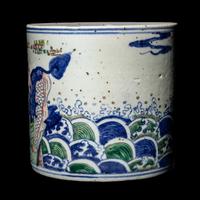 A Chinese Wucai and Underglaze Blue 'Qilin' Porcelain Brushpot, Bitong