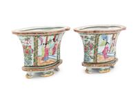 A Pair of Chinese Rose Medallion Porcelain Jardinieres on Stands