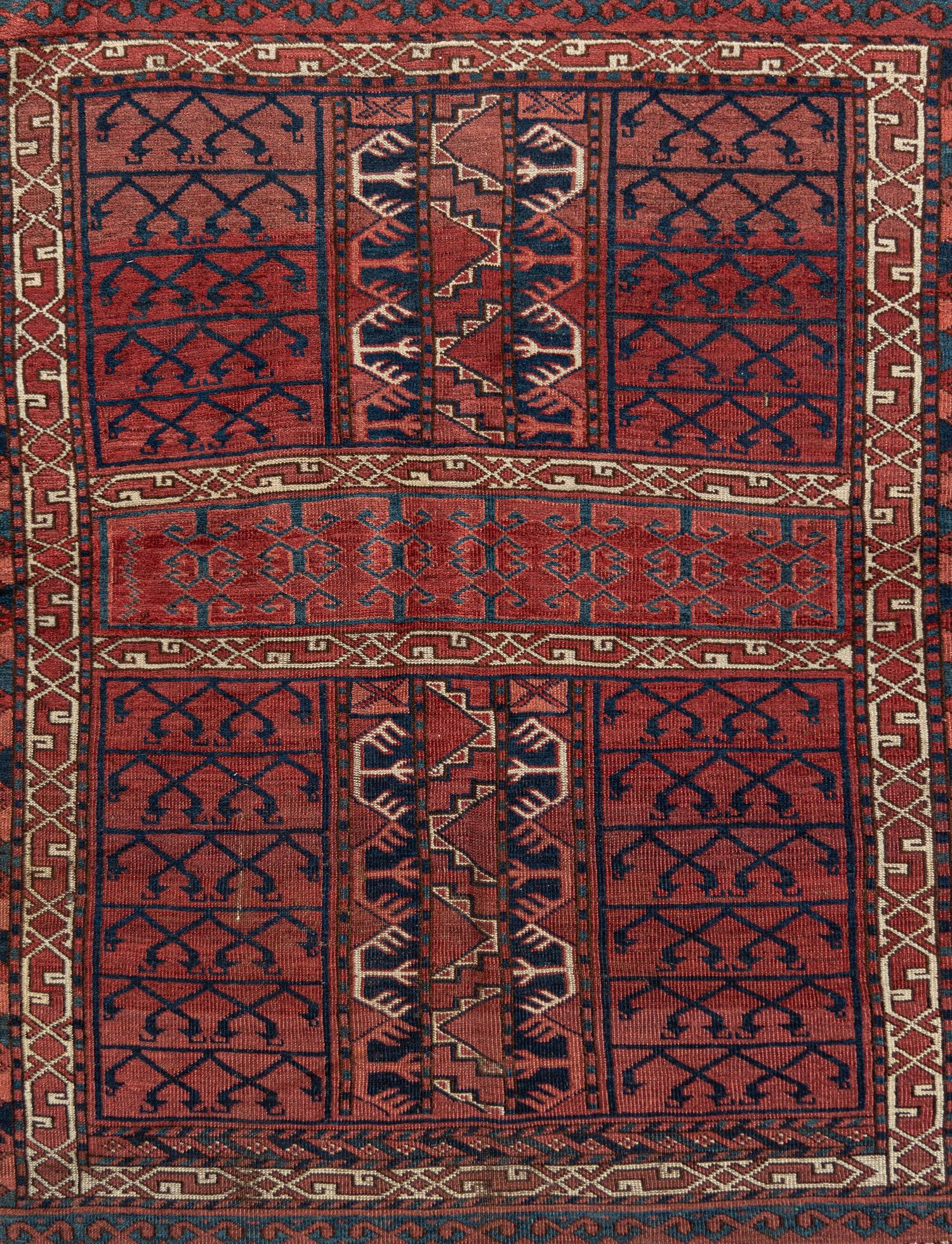 A Turkoman Hatchli Wool Rug