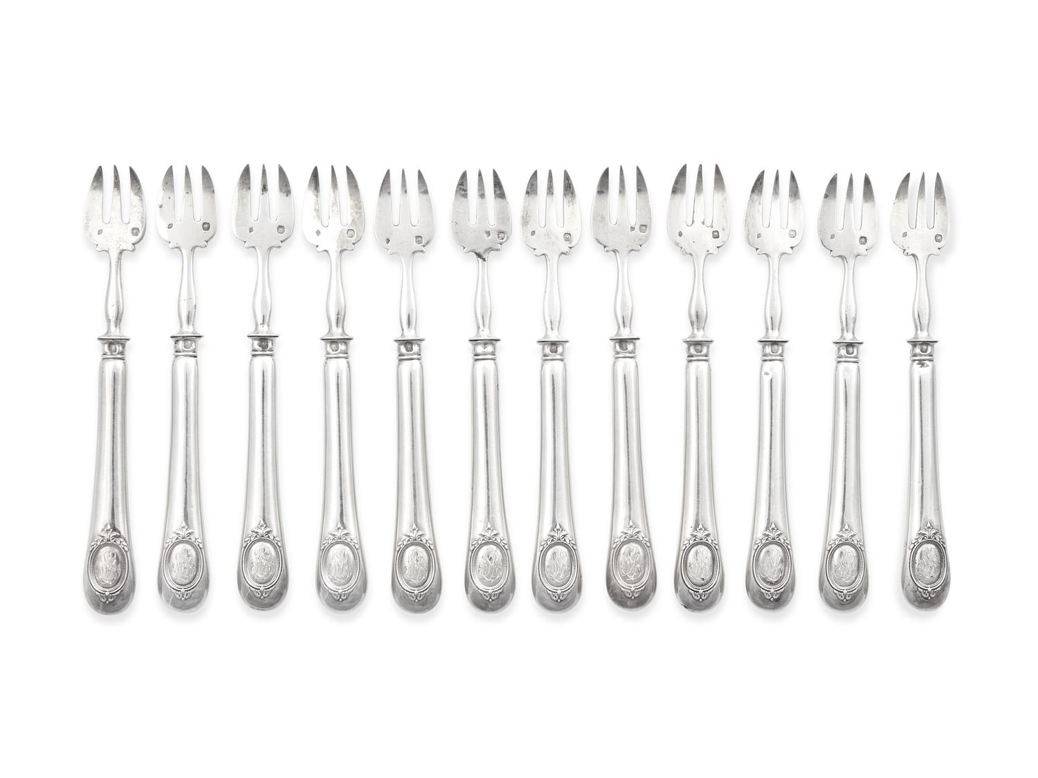 A Set of Twelve French Silver "Baguette and Shield" Oyster Forks