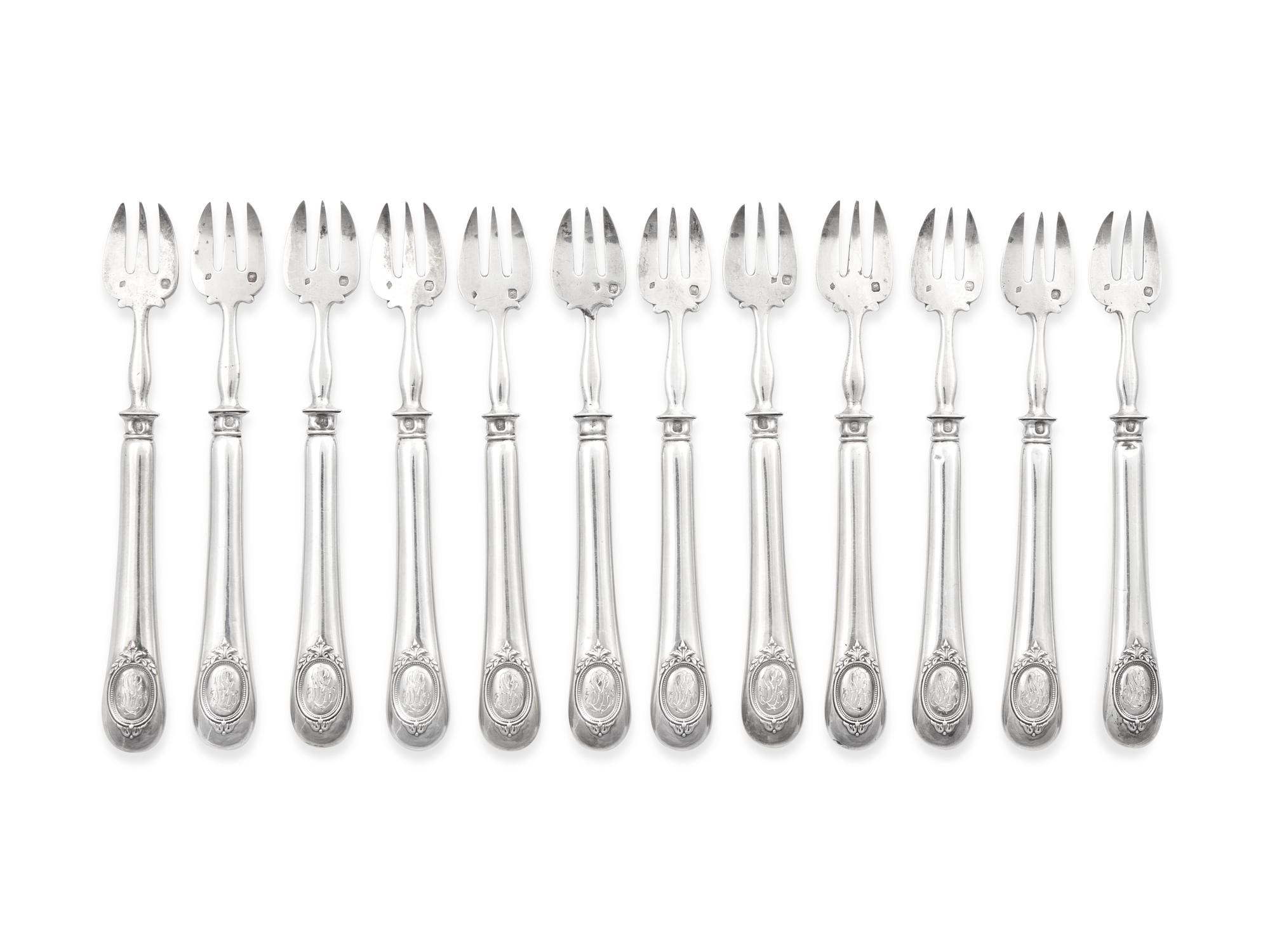 A Set of Twelve French Silver "Baguette and Shield" Oyster Forks