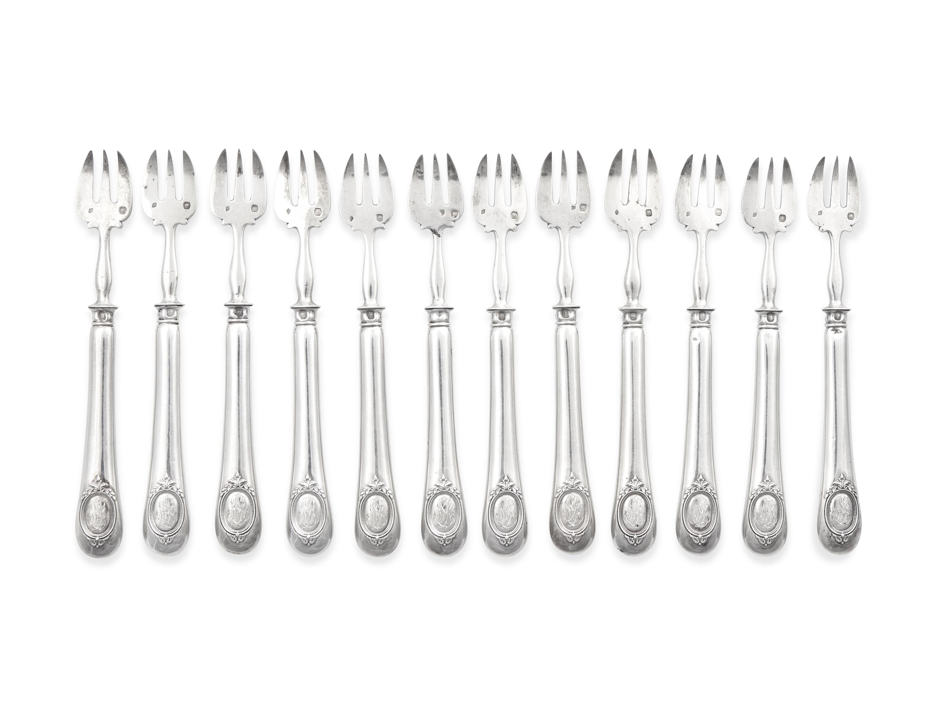 A Set of Twelve French Silver "Baguette and Shield" Oyster Forks