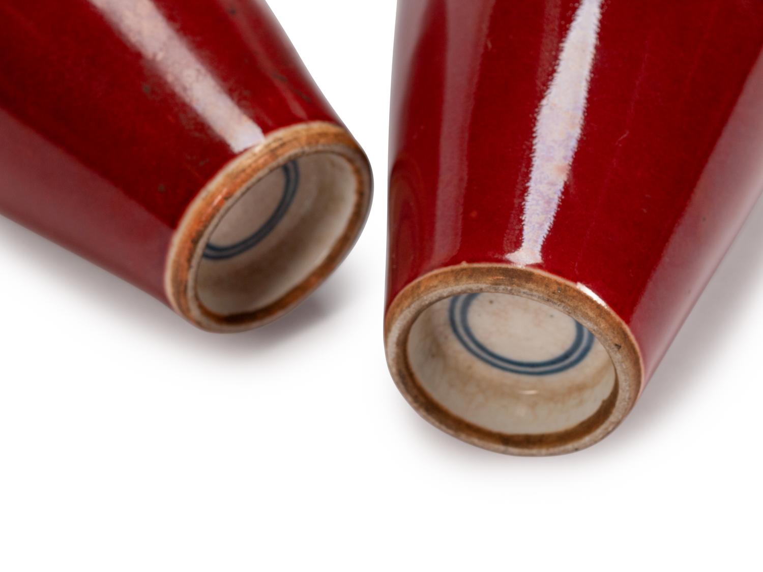 A Pair of Chinese Sang de Boeuf-Glazed Porcelain Shouldered Ovoid Vases