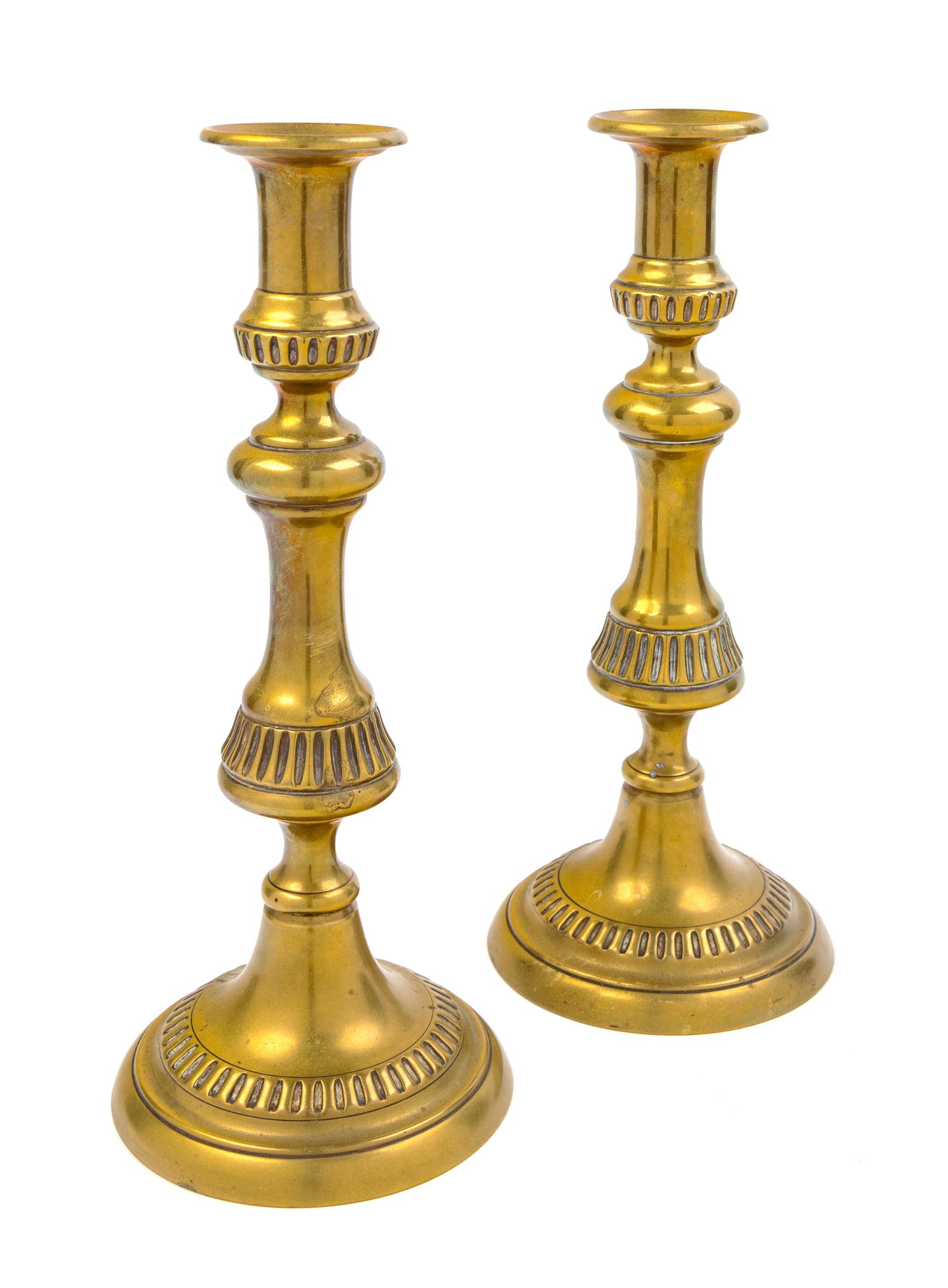A Pair of English Brass Candlesticks