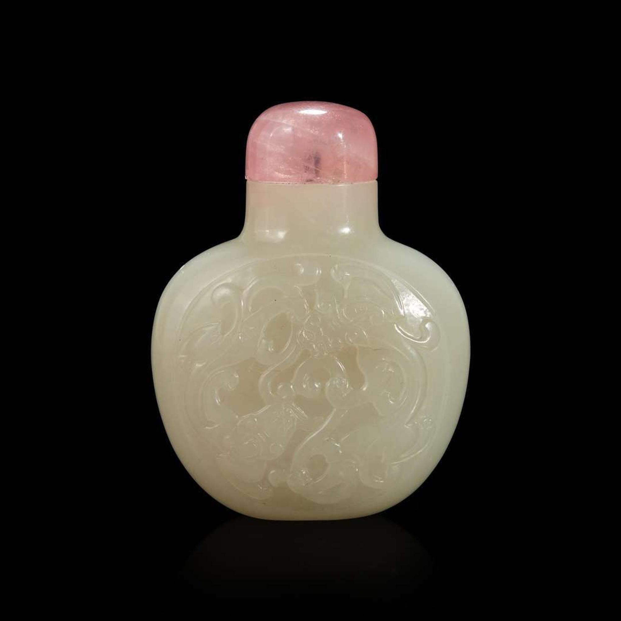 A Chinese carved white jade snuff bottle