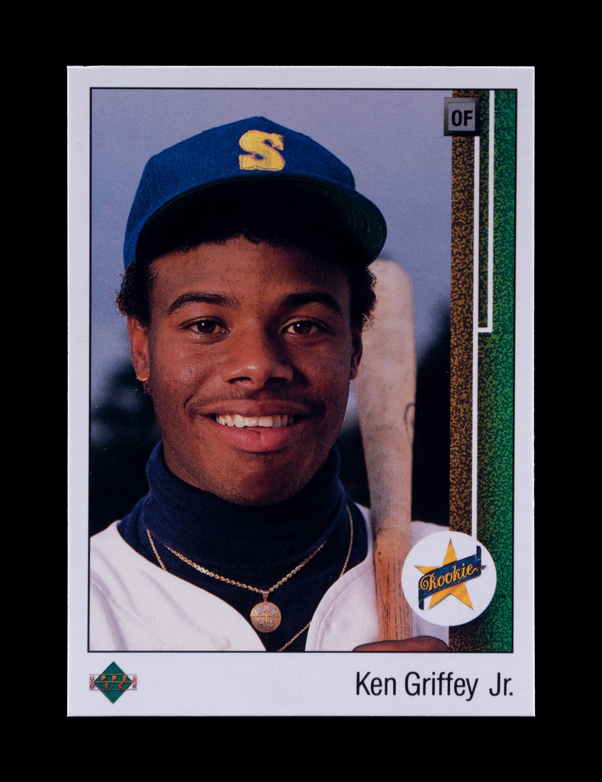 A Group of 22 Hall of Fame and Star Rookie Baseball Cards Including Cal Ripken Jr., Rickey Henderson and Ken Griffey Jr.,