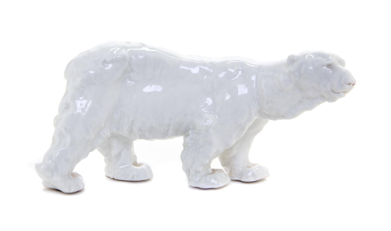 A Continental Porcelain Model of a Polar Bear Width 8 3/4 inches. — OTTO JARL (SWEDISH, 1856-1915), 1934