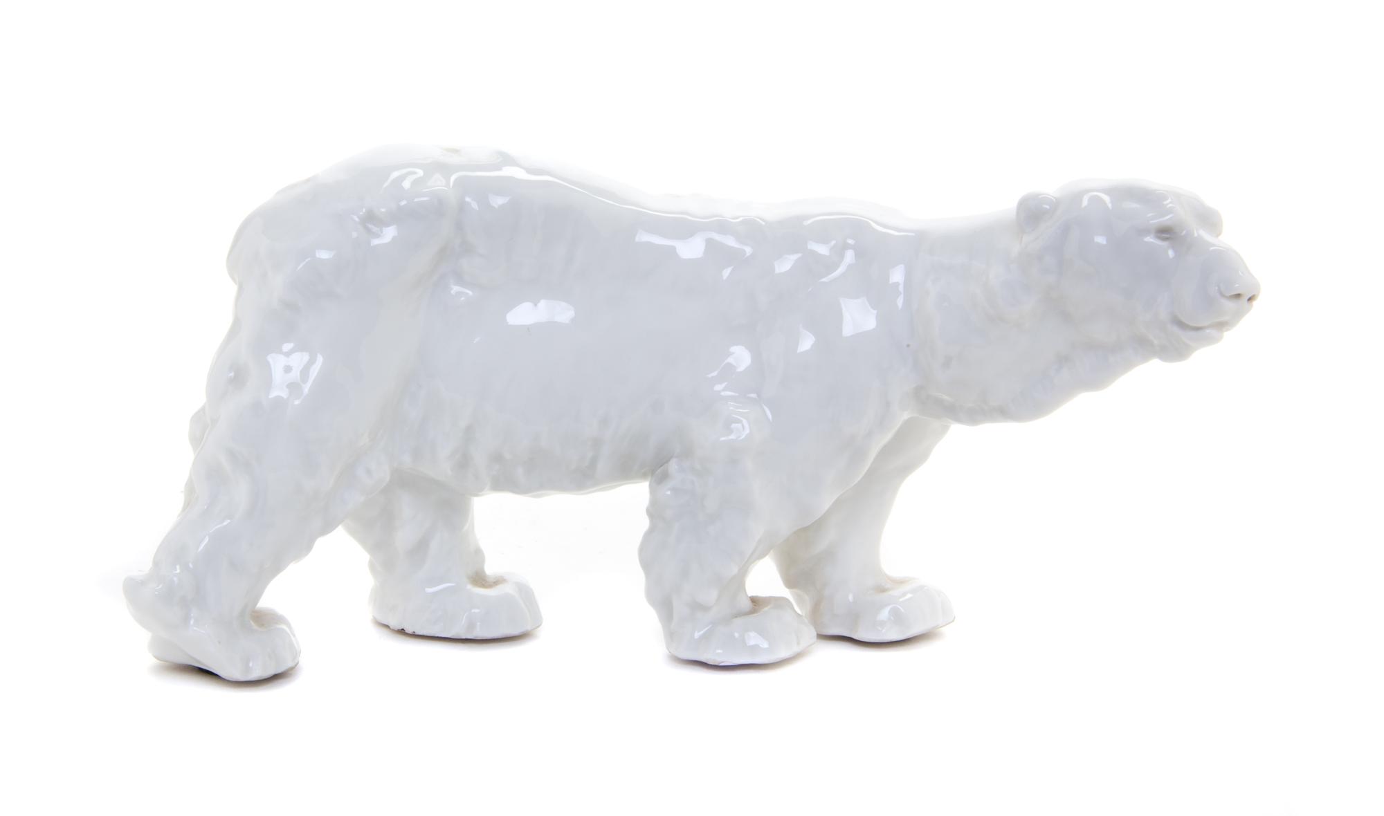 A Continental Porcelain Model of a Polar Bear Width 8 3/4 inches. — OTTO JARL (SWEDISH, 1856-1915), 1934