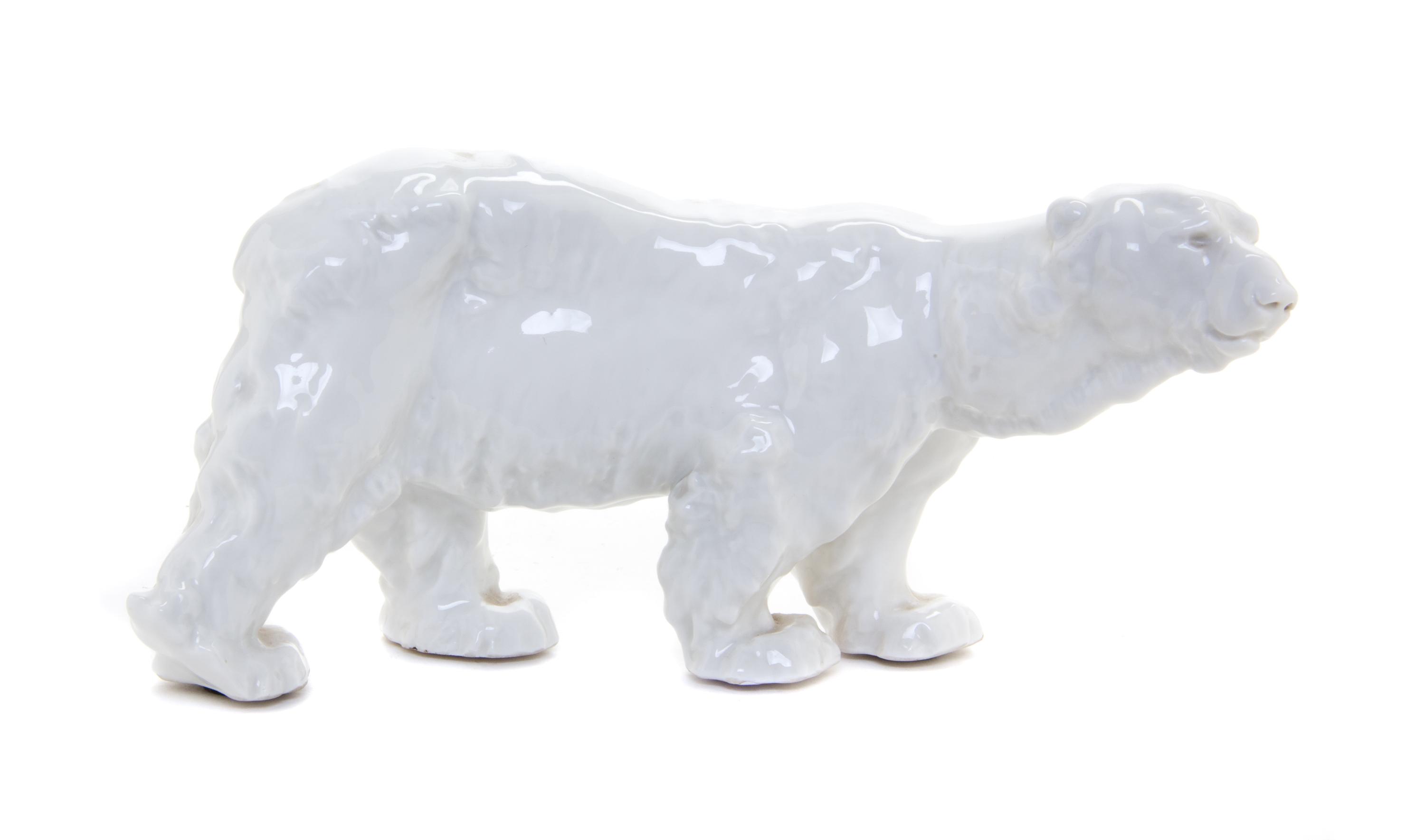 A Continental Porcelain Model of a Polar Bear Width 8 3/4 inches. — OTTO JARL (SWEDISH, 1856-1915), 1934