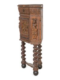 An Italian Renaissance Carved Walnut Corner Cabinet