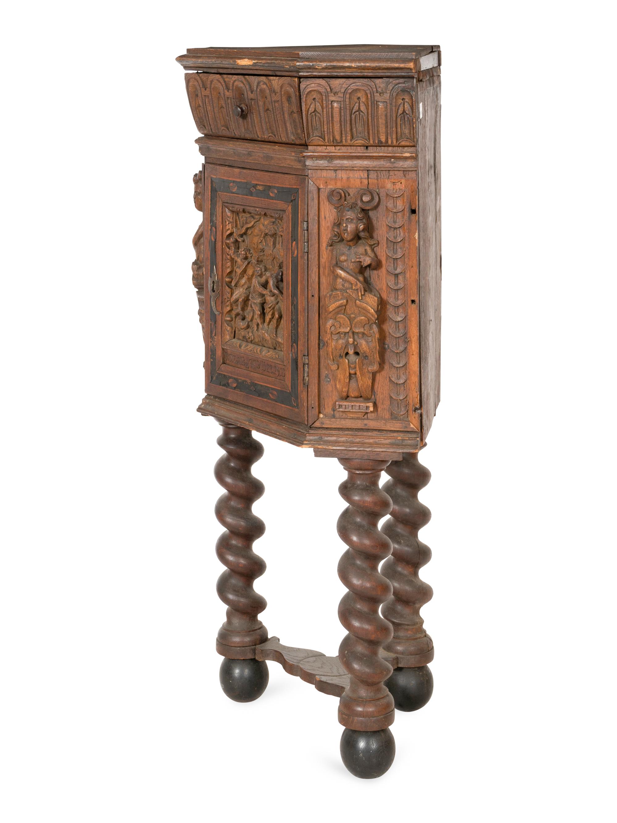 An Italian Renaissance Carved Walnut Corner Cabinet