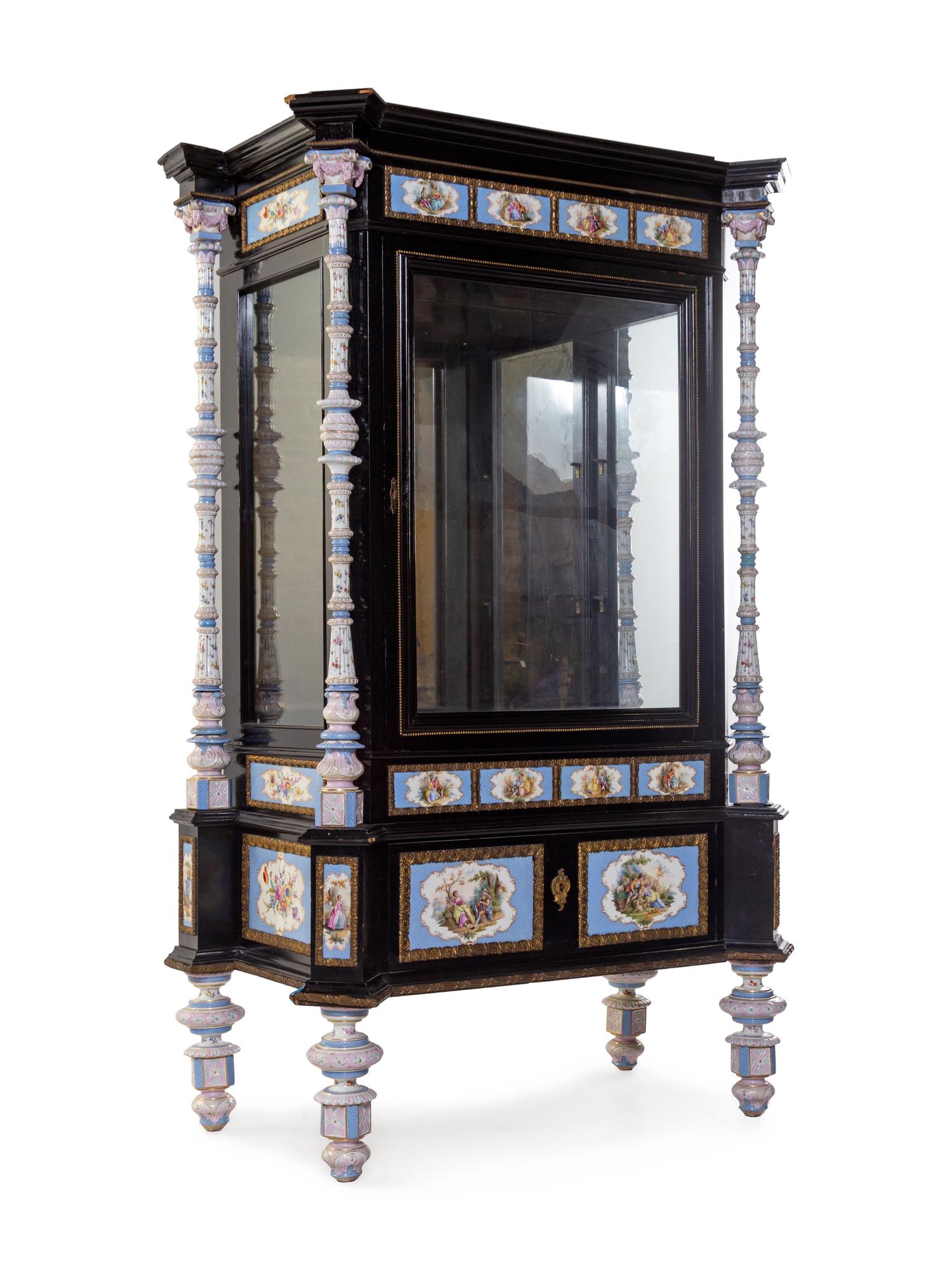 A Meissen and Berlin (K.P.M.) Porcelain Mounted Ebonized Vitrine Cabinet