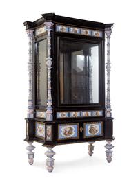 A Meissen and Berlin (K.P.M.) Porcelain Mounted Ebonized Vitrine Cabinet