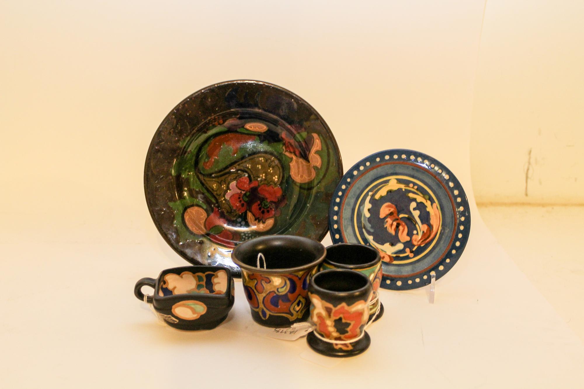 A Group of Four Gouda and Two Associated Plates. Diameter of widest 7 inches.