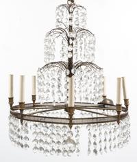 A Baltic Style Gilt Metal Eight-Light Chandelier Height 30 x diameter 24 inches.