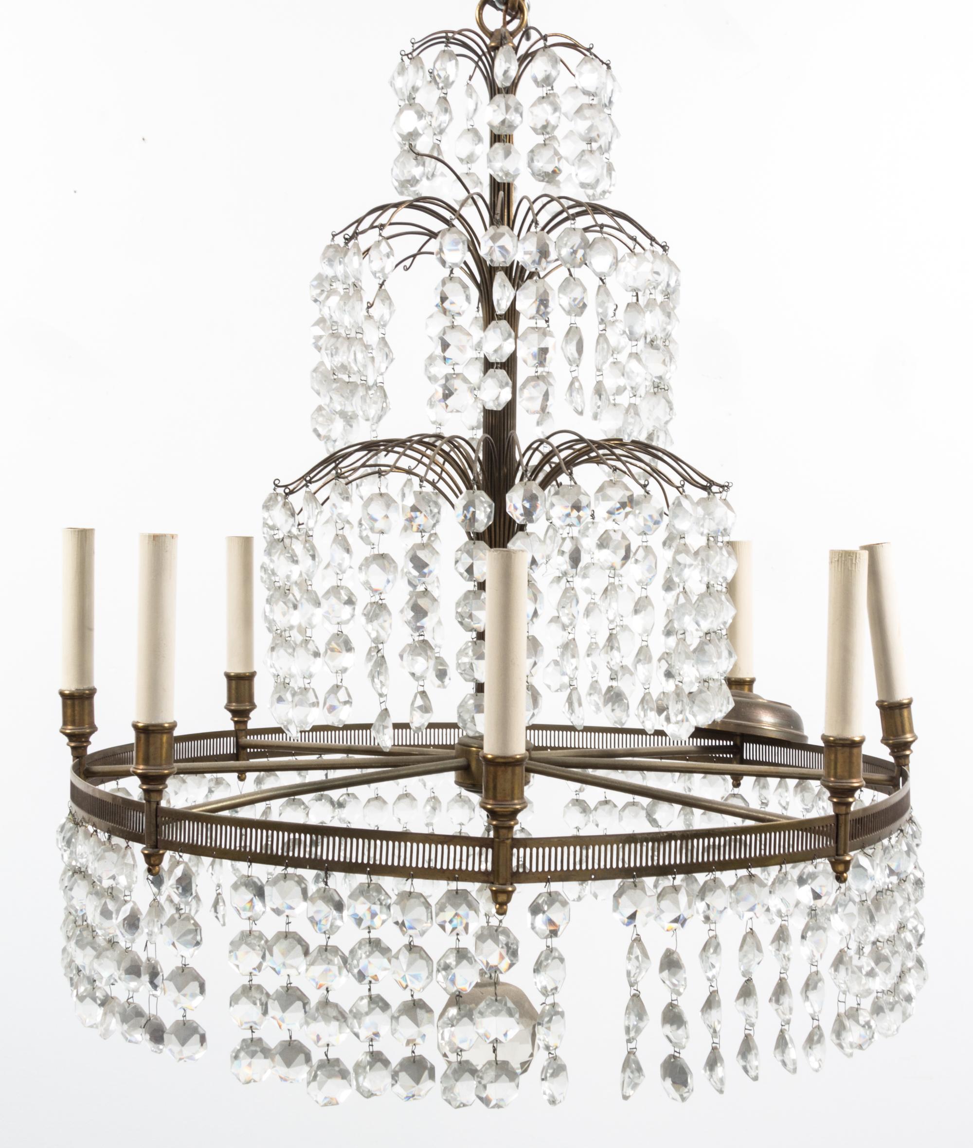 A Baltic Style Gilt Metal Eight-Light Chandelier Height 30 x diameter 24 inches.