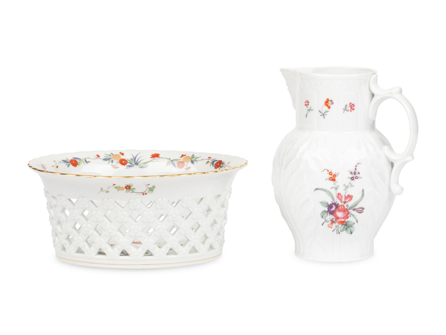 A Mottahedeh Porcelain Pitcher and Centerpiece Basket
