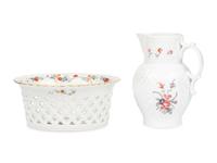 A Mottahedeh Porcelain Pitcher and Centerpiece Basket