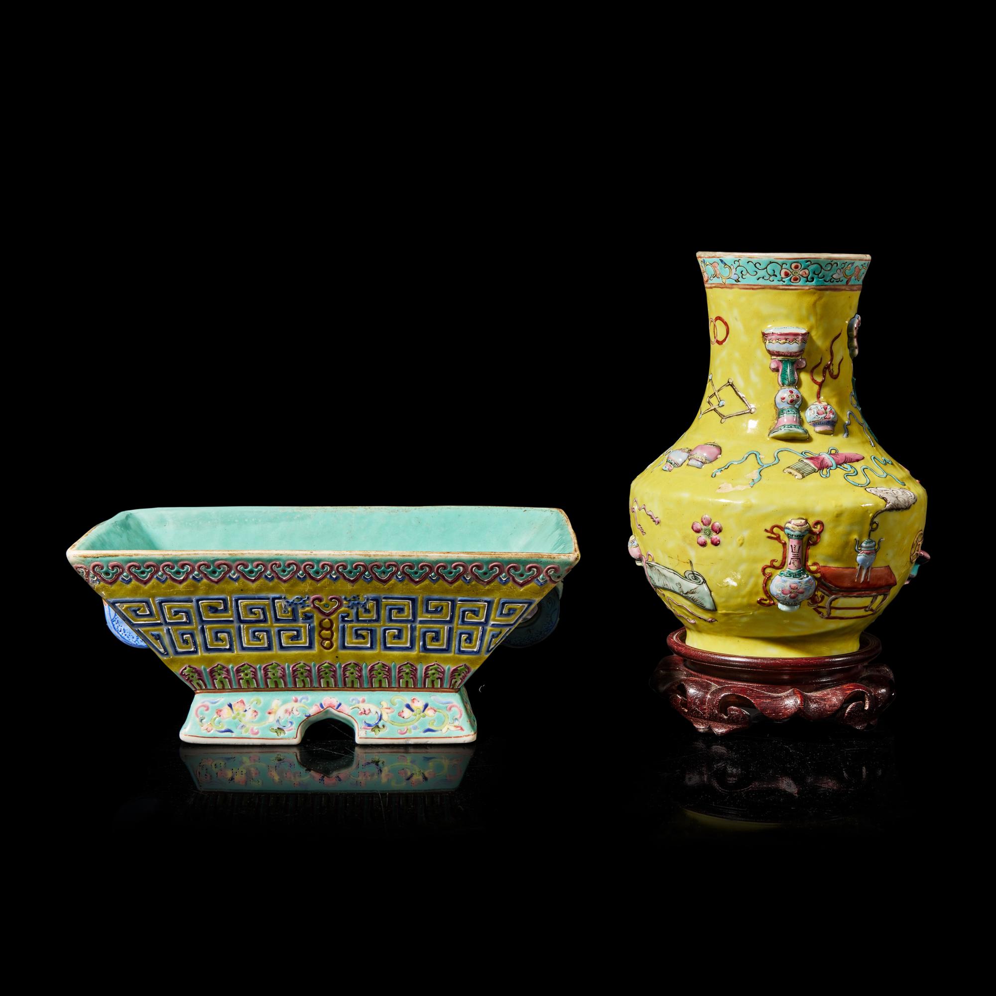 Two Chinese Yellow Ground Famille Rose Porcelain Wares, 19th Century 晚清 黃地粉彩貼塑博古圖瓶及仿古回紋 簠各一