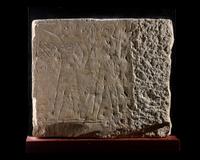 An Egyptian Limestone Relief Fragment Depicting an Offering Scene