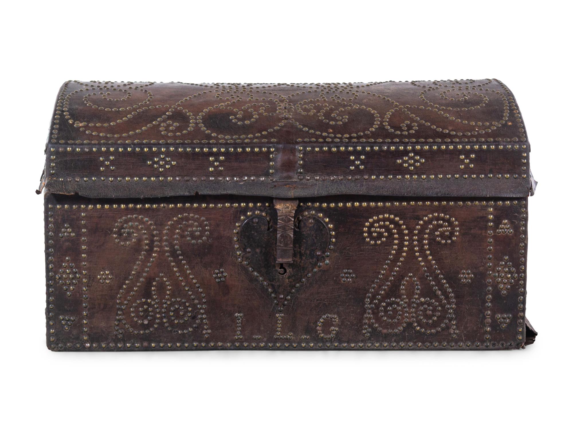 A Continental Nailhead Embossed Leather Trunk