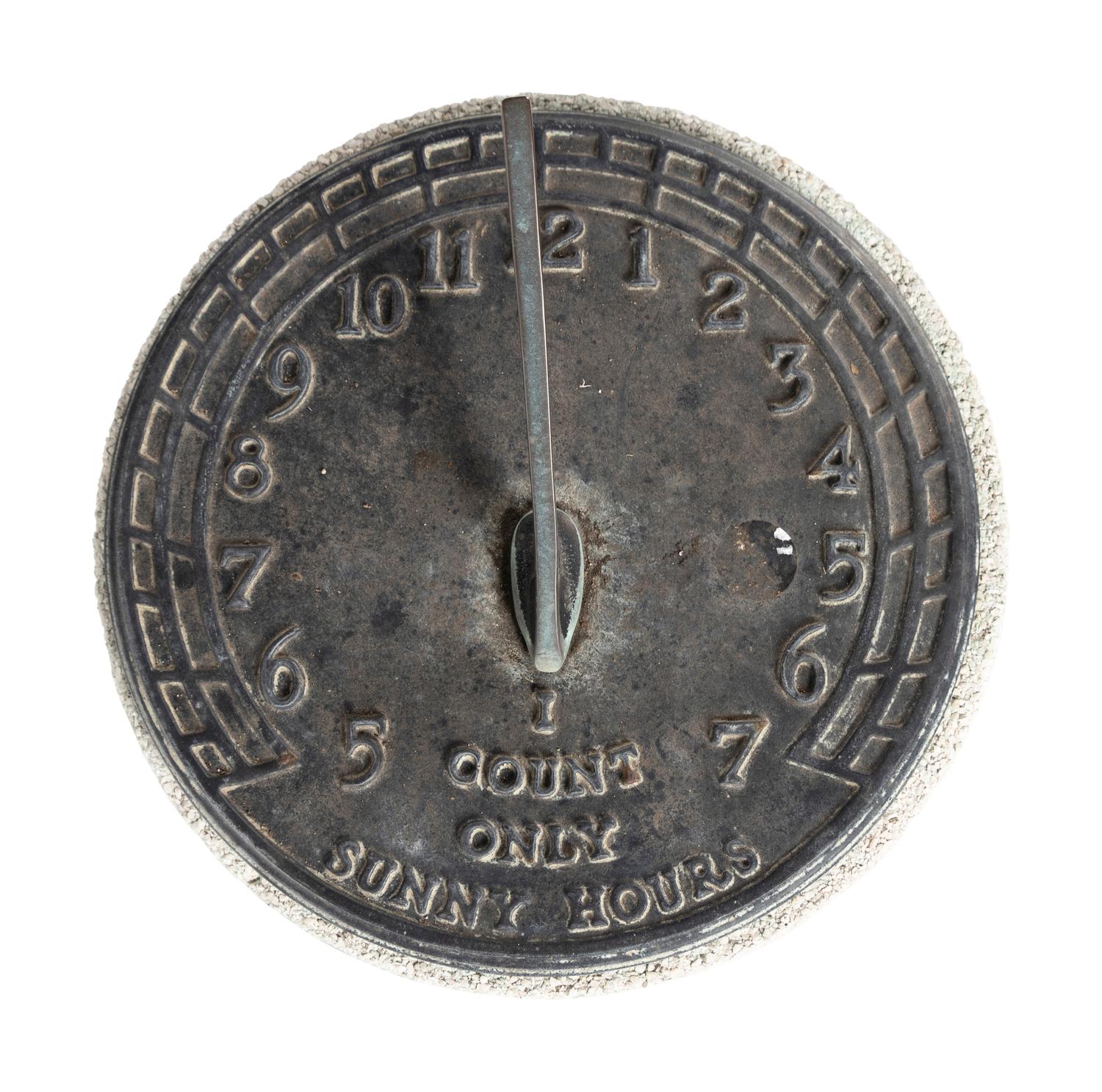 A Bronze Sundial on a Cast Stone Pedestal
