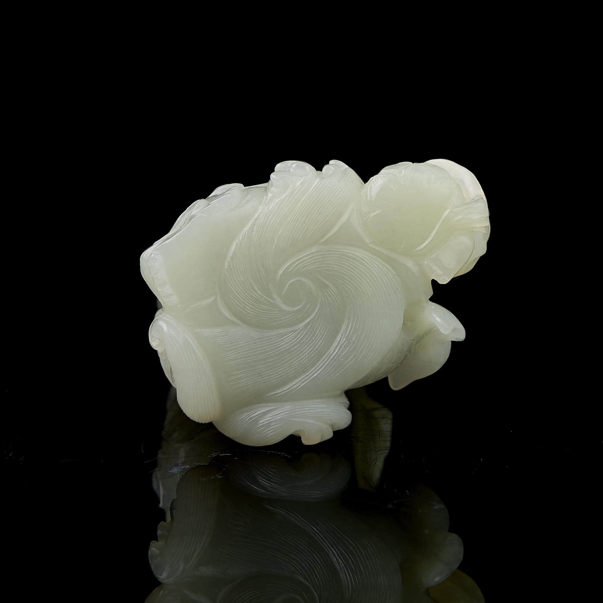 A Chinese Jade Figural Group of Guanyin and Boy 青白玉雕送子觀音