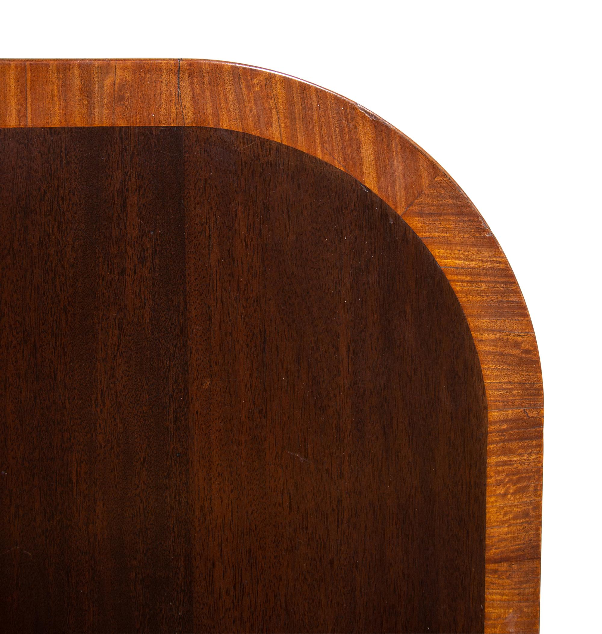 A Regency Style Satinwood Banded Mahogany Triple-Pedestal Dining Table