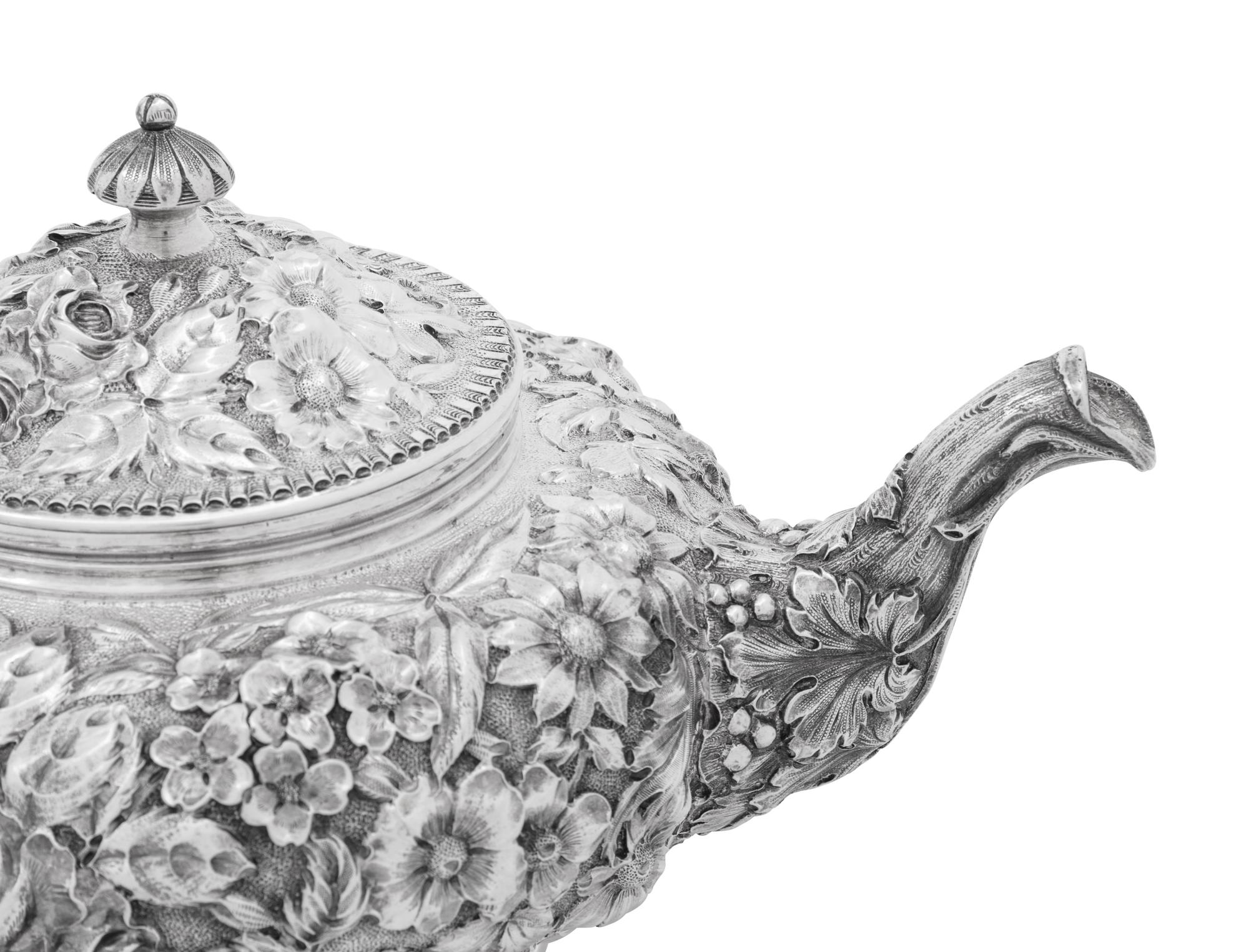 An American Silver Repoussé Four-Piece Tea Service