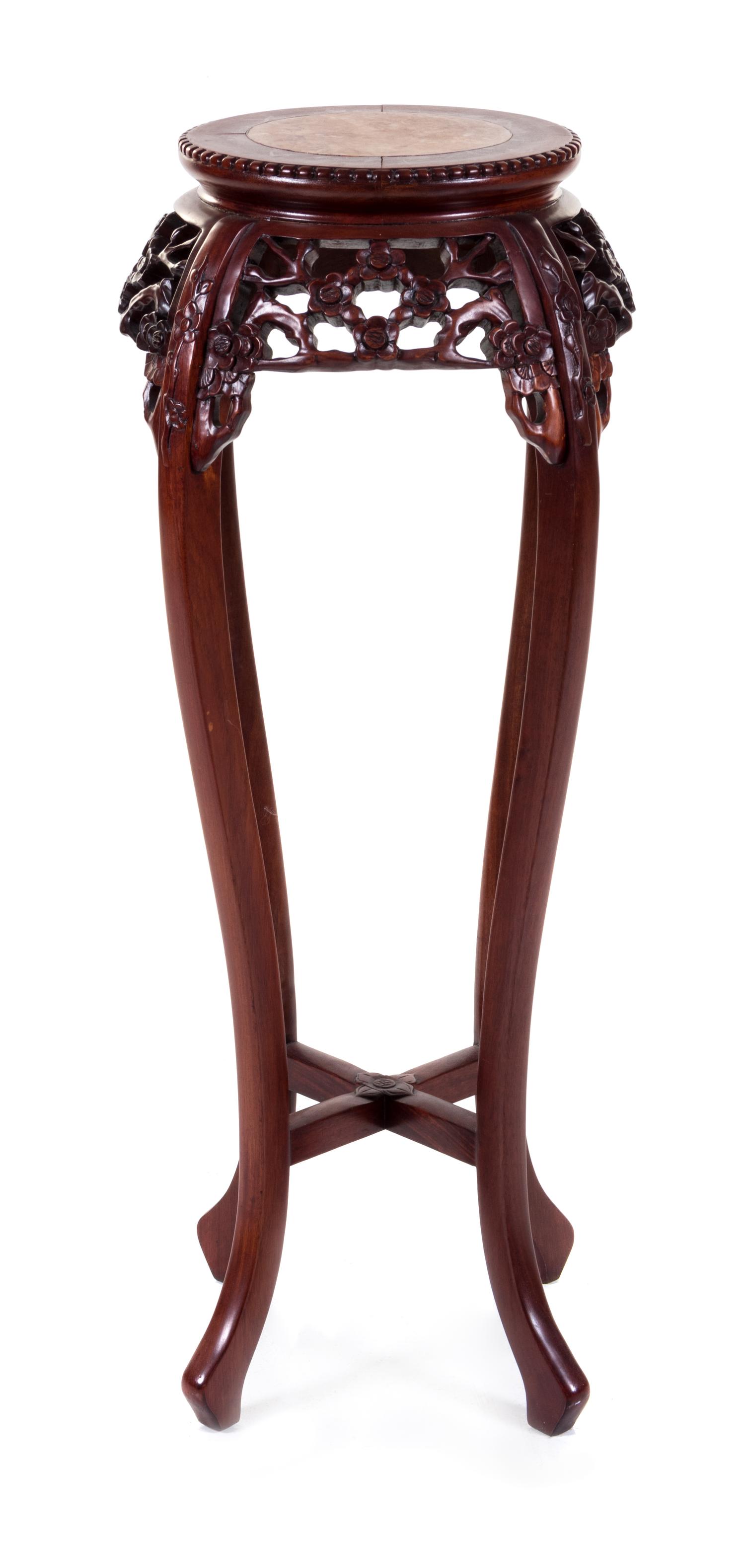 A Chinese Carved Pedestal Table