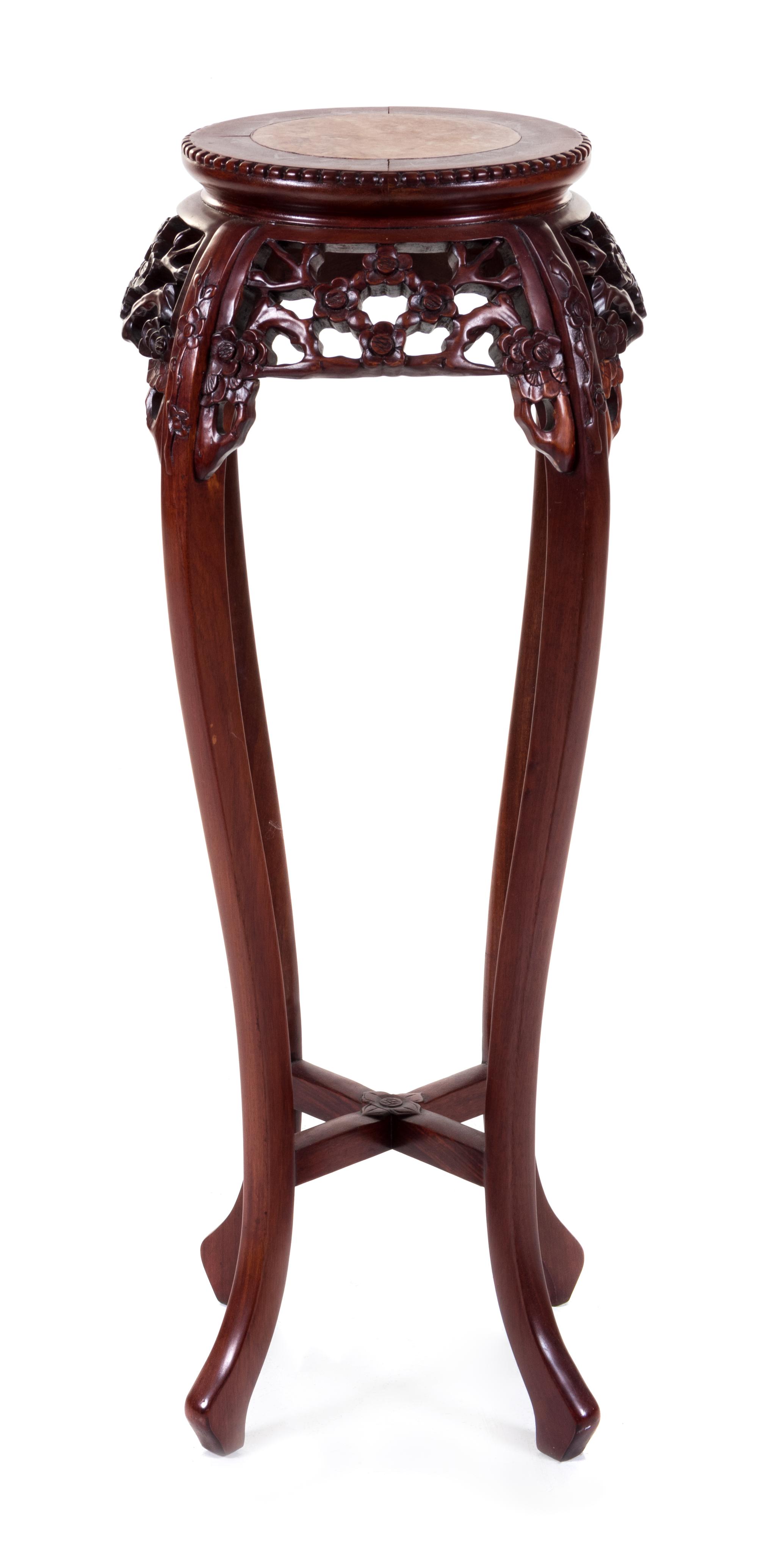 A Chinese Carved Pedestal Table
