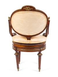 A Regency Style Gilt Metal Mounted Mahogany Swivel Chair — 19TH CENTURY