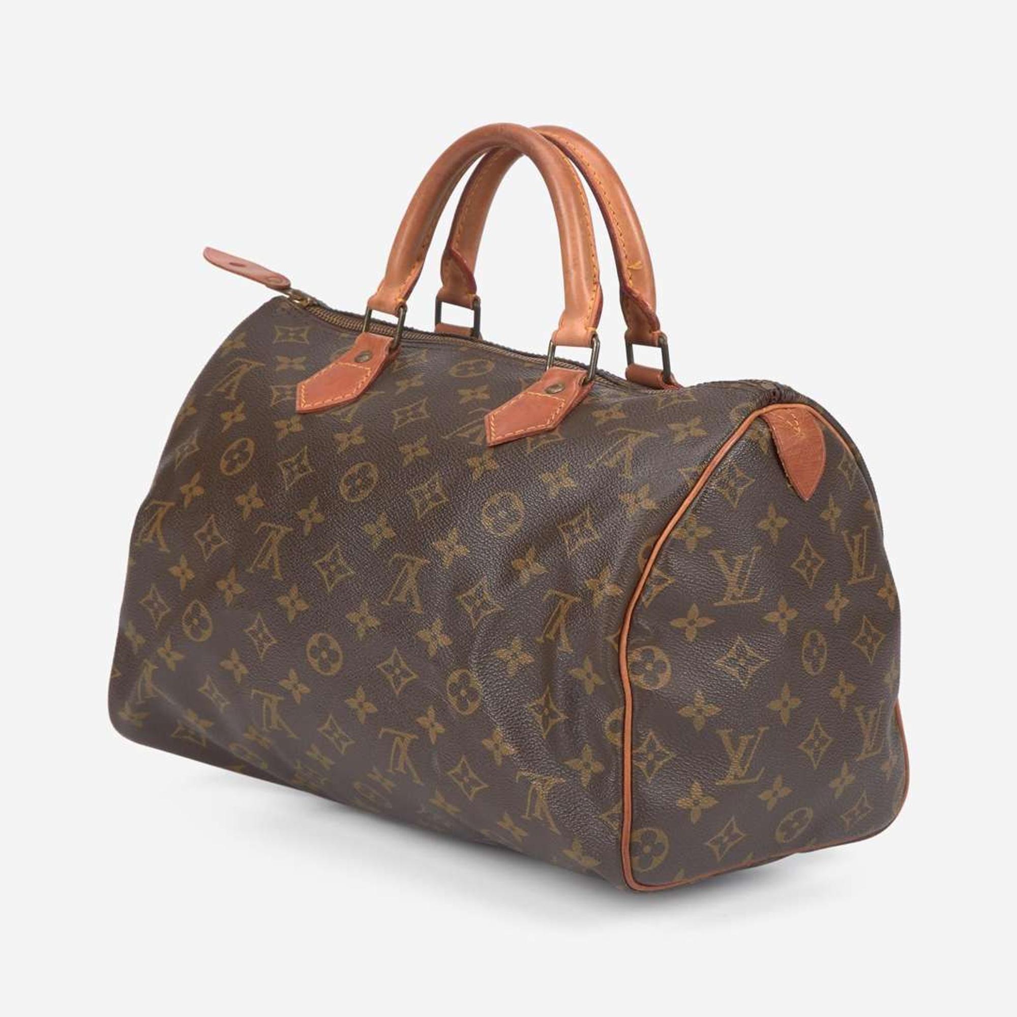 A Louis Vuitton Brown Monogram Speedy 30 Louis Vuitton