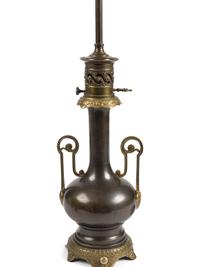 A Pair of French Gilt and Patinated Cast Metal Table Lamps