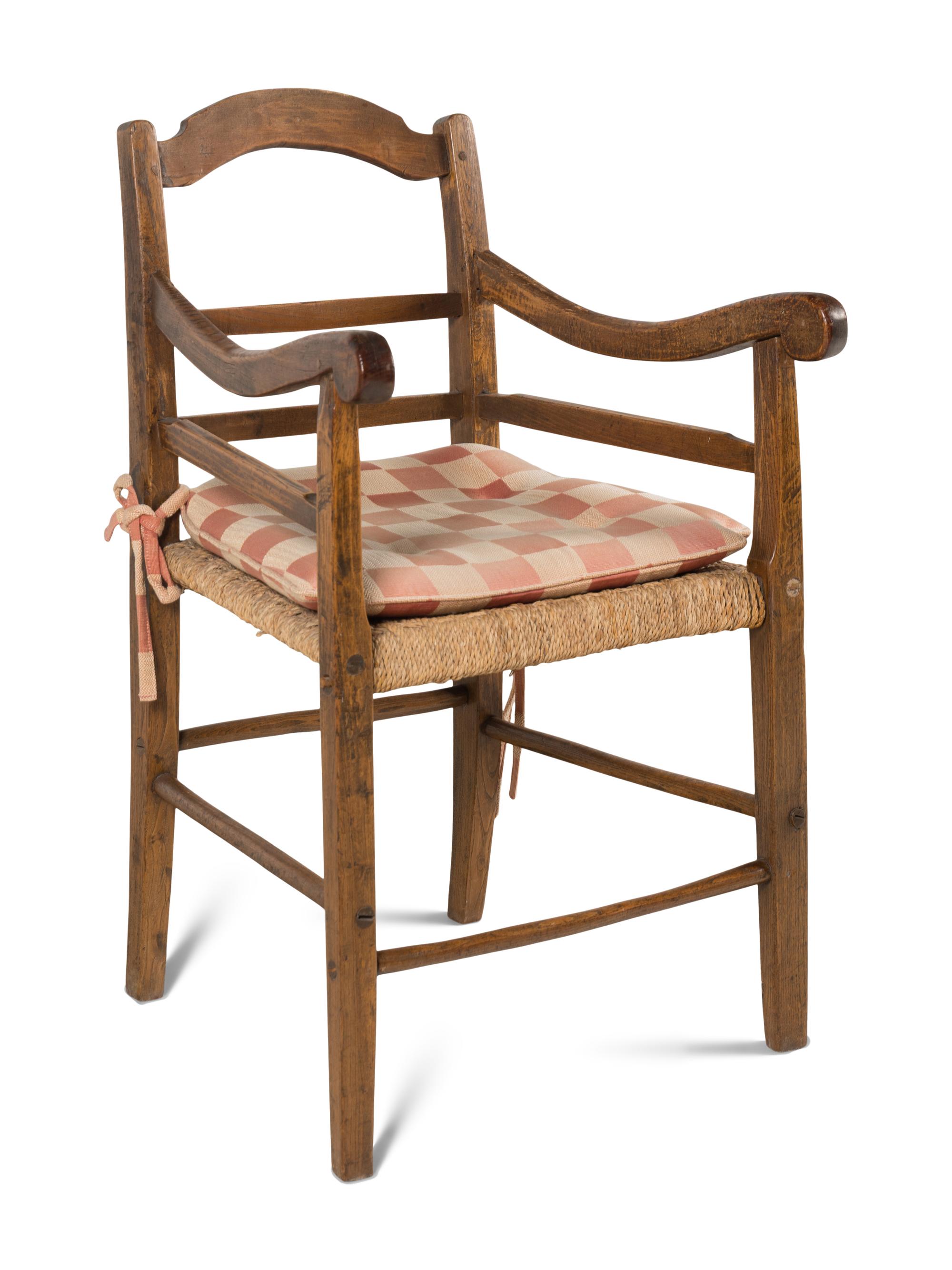 A Ladderback Oak and Rush Seat Armchair