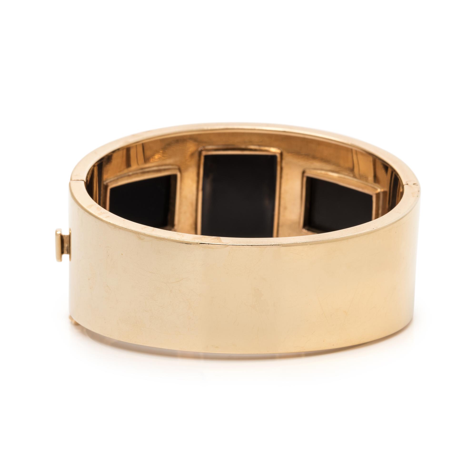 YELLOW GOLD AND ONYX BANGLE BRACELET