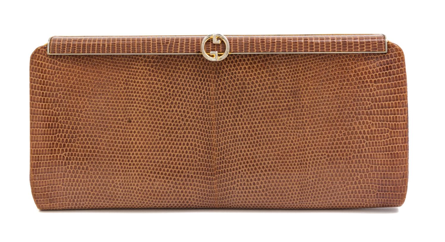 A Gucci Light Brown Reptile Skin Clutch, 10.5" x 5" x 1".