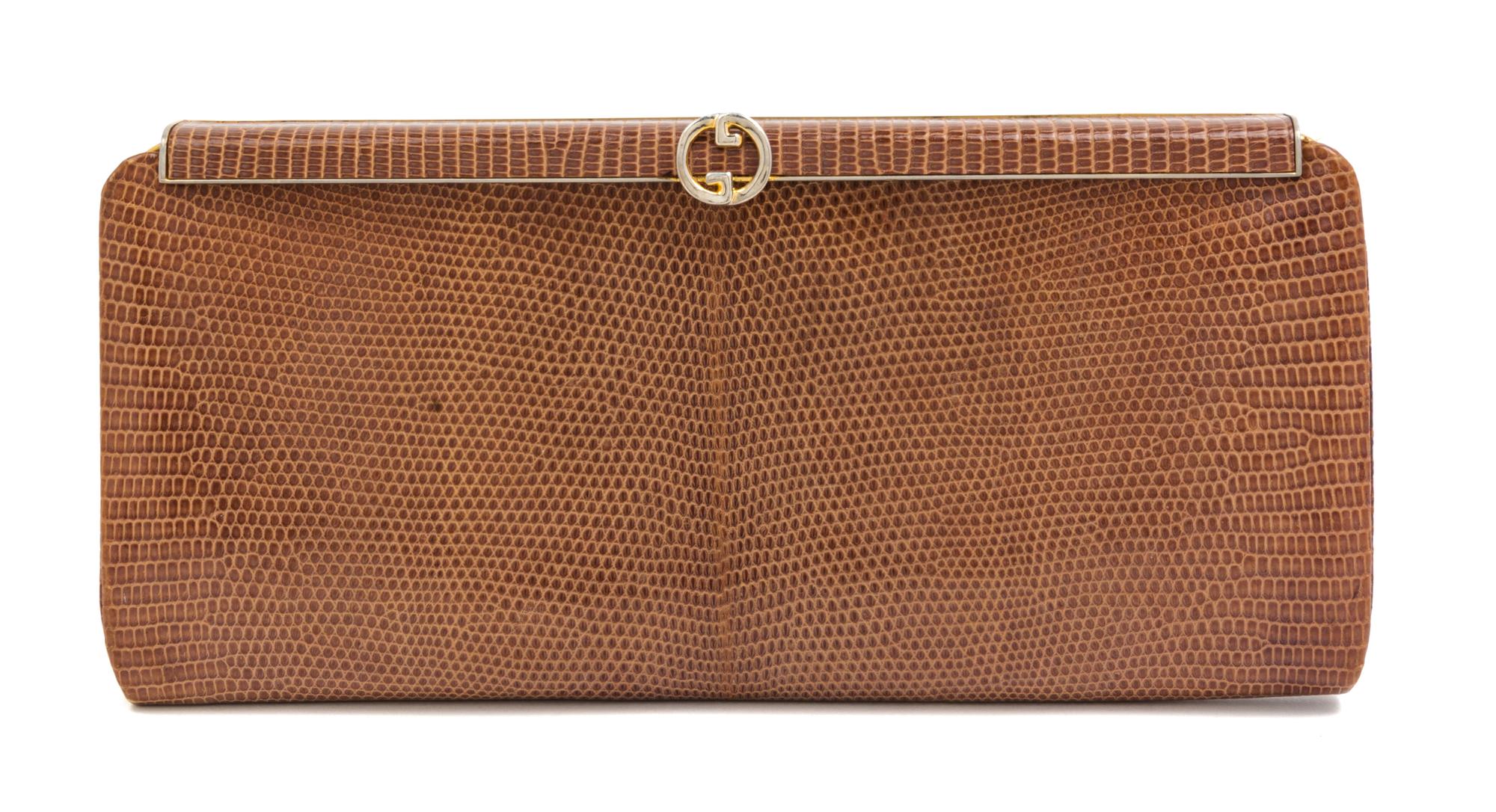 A Gucci Light Brown Reptile Skin Clutch, 10.5" x 5" x 1".